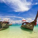 slides/IMG_8528.jpg koh phi phi don, island, longtail, boat, decoration, traditional, flower, sea, resort, sky, cloud, colour, krabi, province, thailand SEAT6 - Longtail Boat, Phi Phi Don Island
